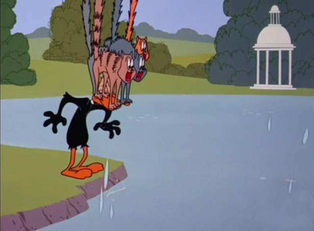 Fast Buck Duck - Daffy Duck by pond with cartoon cats on his head