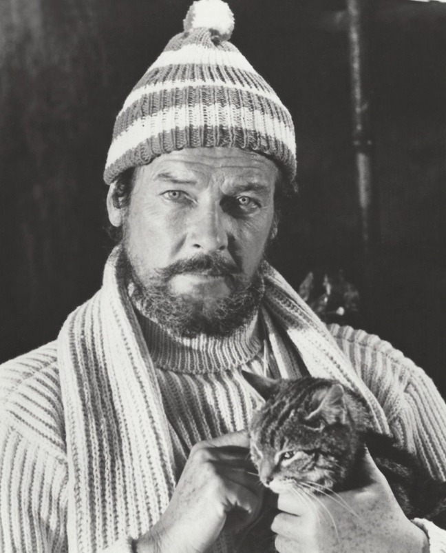 ffolkes - promotional still Roger Moore and cat