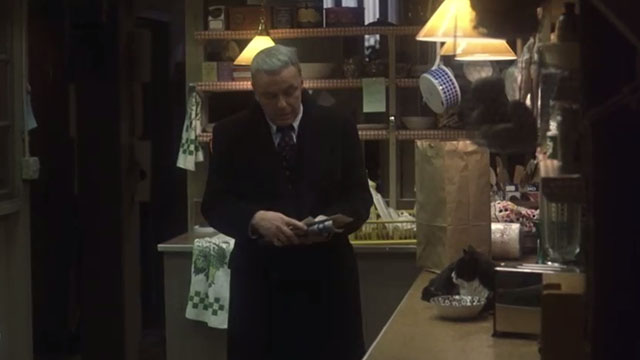 The First Deadly Sin - Edward Delaney Frank Sinatra with tuxedo cat Rocky sitting on kitchen counter