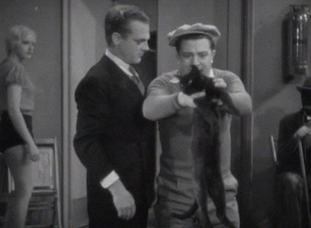 Footlight Parade - Francis carries black cat into rehearsal room