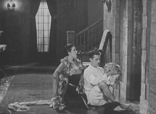 Forgotten Sweeties - longhair tabby cat held by Thurston Charley Chase in hallway with Lillian Anita Garvin