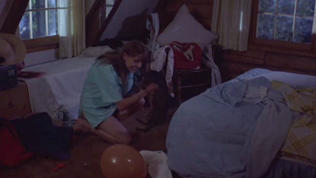 Friday the 13th Part VII The New Blood - tabby cat being picked up by Robin Elizabeth Kaitan