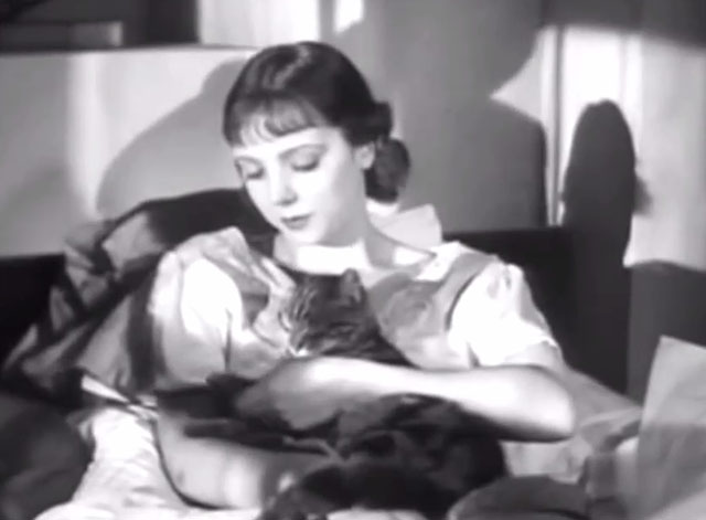 Friday the Thirteenth - Milly Jessie Matthews with tabby cat in bed