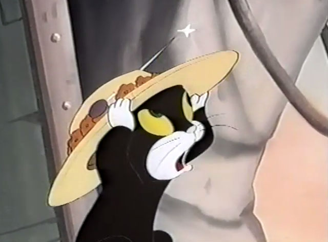 Frightday the 13th - cartoon black kitten Lucky wearing hat with pin