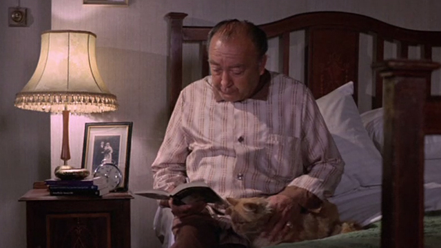 From Beyond the Grave - Mr. Jeffries Tommy Godfrey and ginger tabby cat on bed reading story