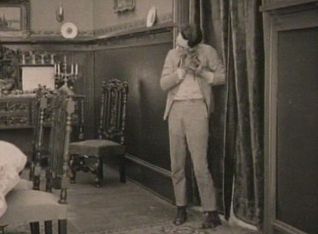 From Hand to Mouth - Harold Lloyd and gray kitten