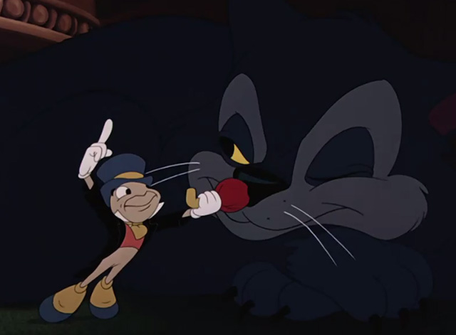 Fun & Fancy Free - Jiminy Cricket pokes sleeping black cat in nose with umbrella