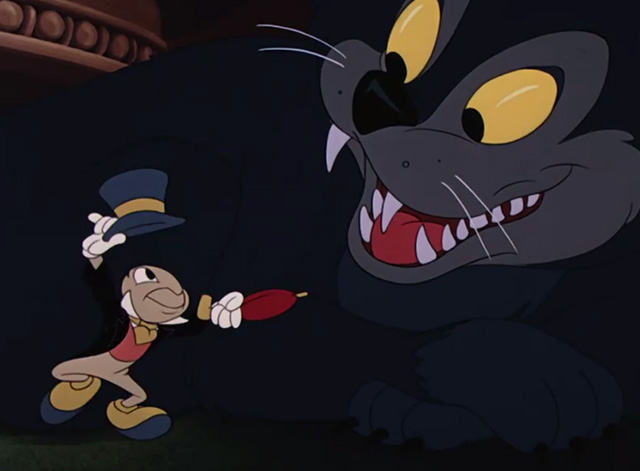 Fun & Fancy Free - Jiminy Cricket backs away from black cat showing fangs