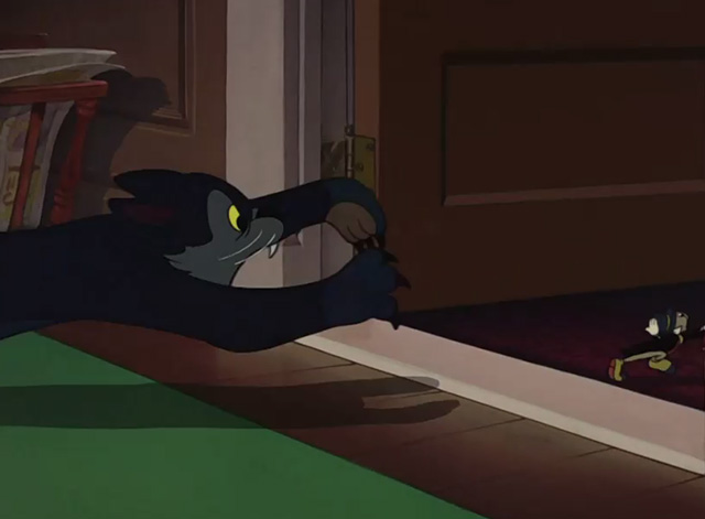 Fun & Fancy Free - black cat chasing Jiminy Cricket into another room