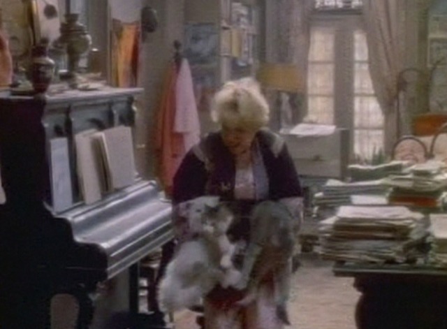 Garbo Talks - Sonya carries three cats into bathroom