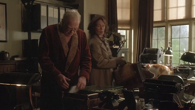 The Gathering Storm - orange and white cat on desk behind Churchill Albert Finney as Violet Celia Imrie enters