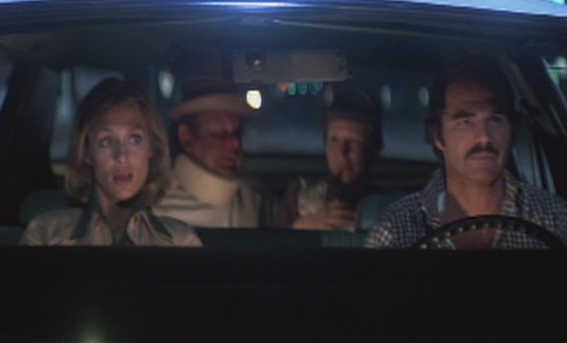 Silver Bell cat in back seat with Aggie and Irving