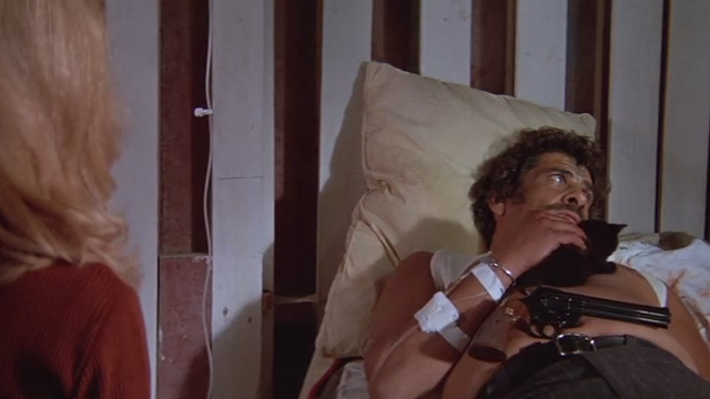 The Getaway - Rudy Al Lettieri with black kitten Poor Little Harold on chest