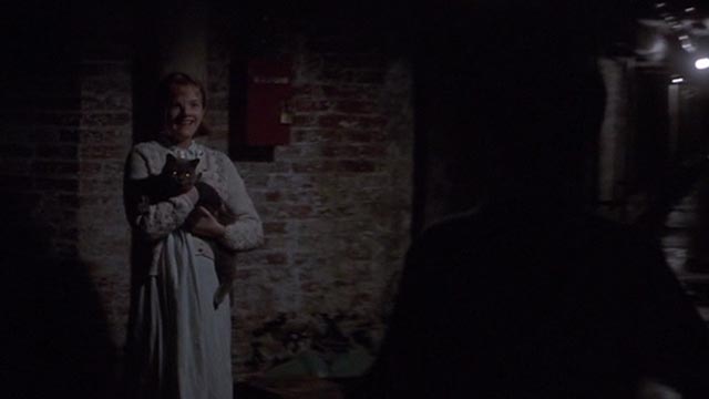 Girl, Interrupted - Susanna Winona Ryder with Polly Elizabeth Moss holding Ruby gray cat