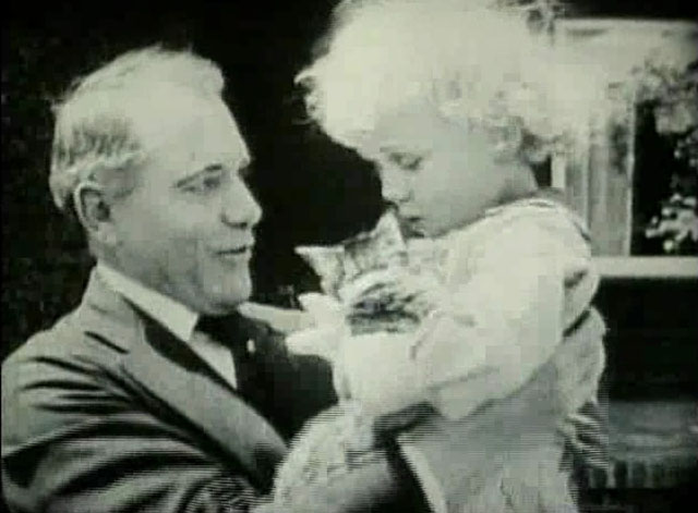 Going Straight - Mr. Remington Ralph Lewis holding up Francis Carpenter with small tabby cat