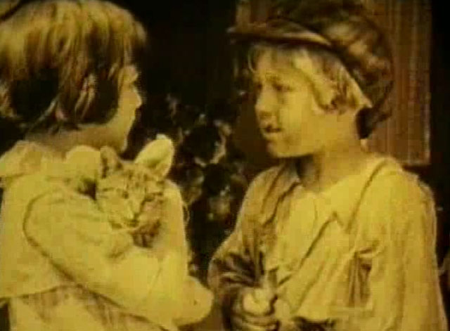 Going Straight - Violet Radcliffe holding tabby cat with waif Georgie Stone