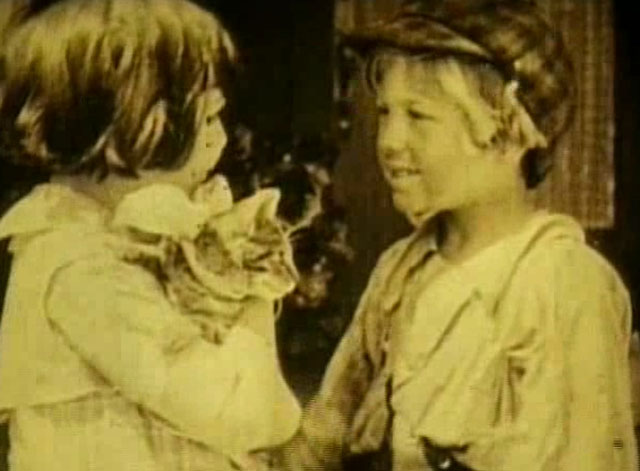 Going Straight - Violet Radcliffe holding tabby cat with waif Georgie Stone