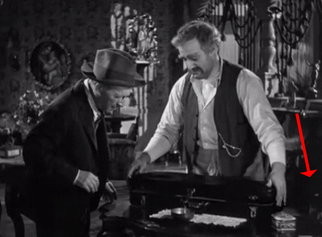 Golden Boy - calico cat on floor behind Mr. Bonaparte Lee J. Cobb