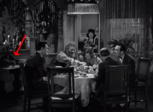 Golden Boy - family eating with cat on side table