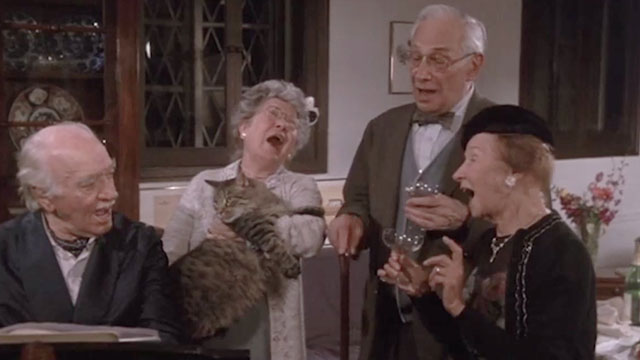 Grace Quigley - Sarah Frances Pole holding longhair tabby cat Winnifred, Homer Walter Abel, Sam Truman Gaige and Emily Elizabeth Wilson singing