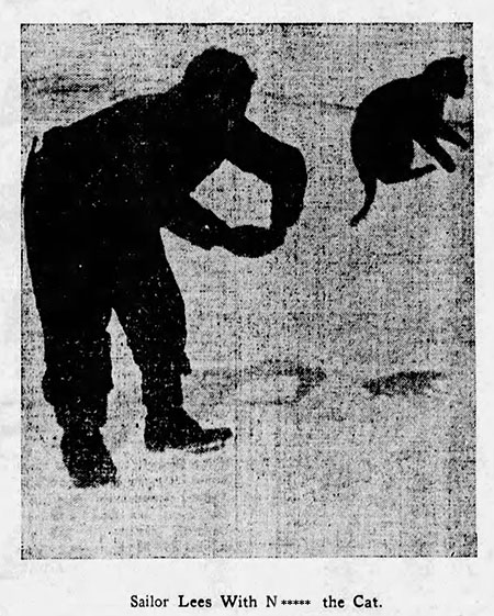 The Great White Silence - newspaper photo of black cat jumping through the hooped arms of sailor Lees from Terra Nova