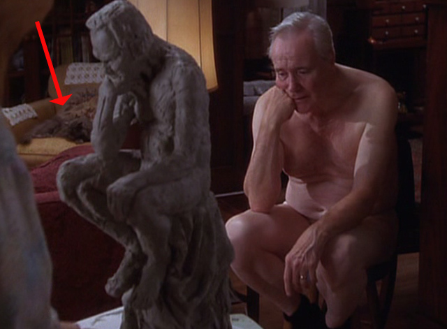 Grumpier Old Men - gray cat Slick sitting on chair in background