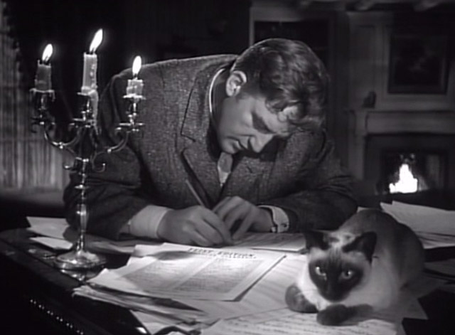 Hangover Square - George Laird Cregar writing music with Siamese cat