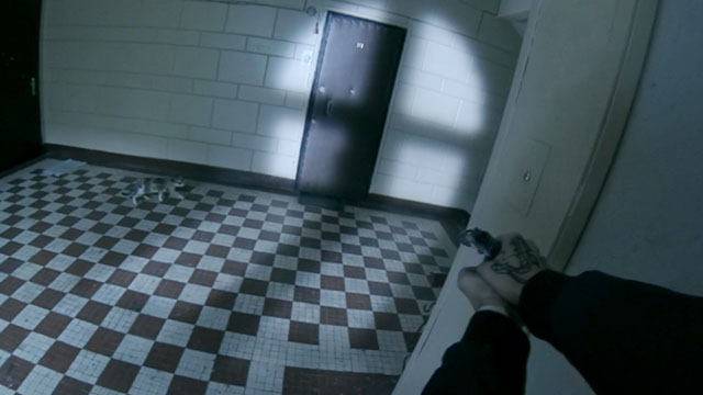 Hardcore Henry - calico cat running in hallway