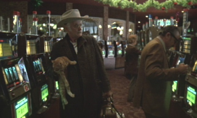 Harry & Tonto - Harry Art Carney carrying ginger tabby cat Tonto through casino