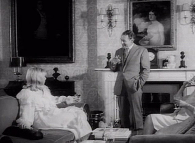 Having a Wild Weekend - Dinah Barbara Ferris petting gray cat on couch with Guy Robin Bailey