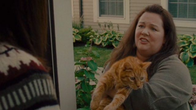 The Heat - Mullins Melissa McCarthy holding orange tabby cat Pumpkin