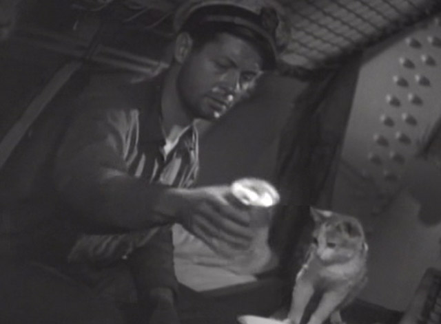 Hell Below - Robert Montgomery tries to pour out condensed milk for calico cat
