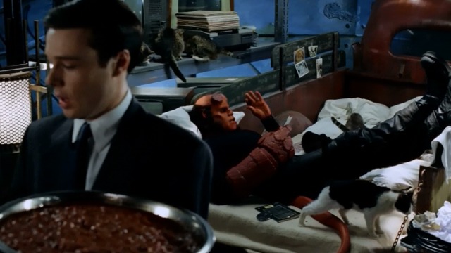 Hellboy - Ron Perlman Hellboy on bed with cats