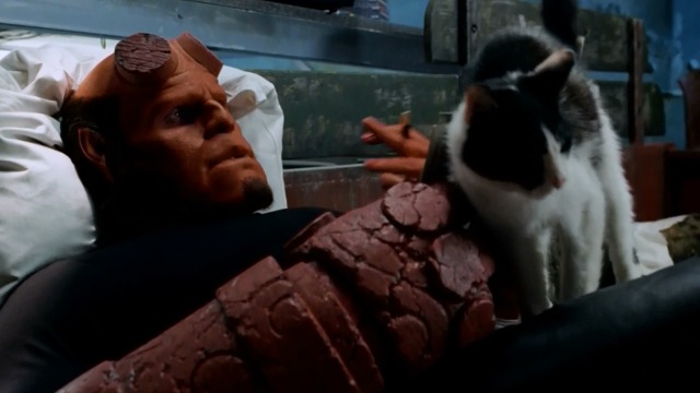 Hellboy - Ron Perlman with cat crossing lap