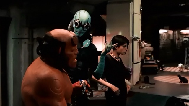 Hellboy II: The Golden Army - Hellboy Ron Perlman with Abe and Liz Selma Blair and cats in background
