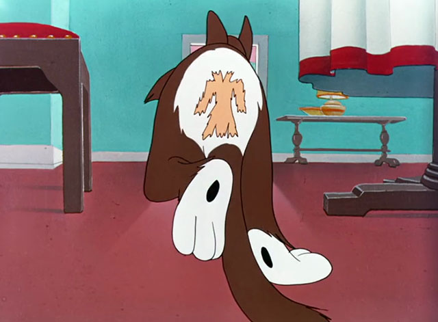 A Hick, a Slick and a Chick - cartoon brown and white cat Herman walking away with coat pattern cut from butt fur