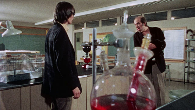 Horror High - Vernon Pat Cardi with janitor Mr. Griggs Jeff Alexander holding black cat in his arms