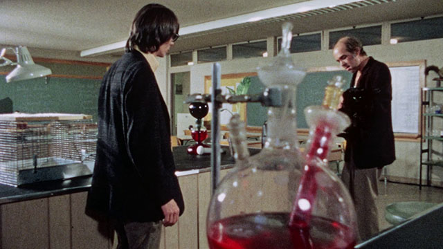 Horror High - Vernon Pat Cardi with janitor Mr. Griggs Jeff Alexander holding black cat in his arms