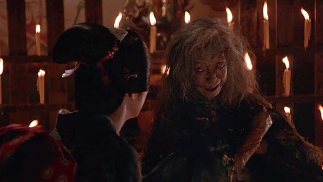 The House Where Evil Dwells - Otami Mako Hattori with old witch Tsuyako Okajima holding black cat in arms