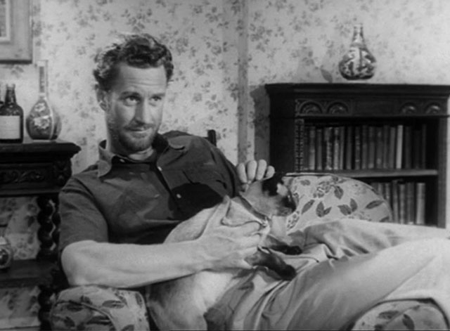 The House in the Woods - Spencer Ronald Howard with seal point Siamese cat Cleopatra on lap