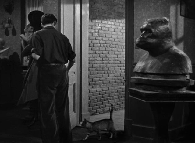 House of Horrors - Marcel Martin Kosleck entering home with grey tabby cat Pietro following