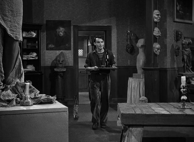 House of Horrors - Marcel Martin Kosleck walking with wine on tray and grey tabby cat Pietro following