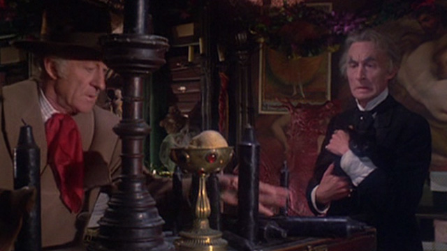 The House That Dripped Blood - black cat being held by Theo Von Hartmann Geoffrey Bayldon while candle is knocked over by Paul Henderson John Pertwee