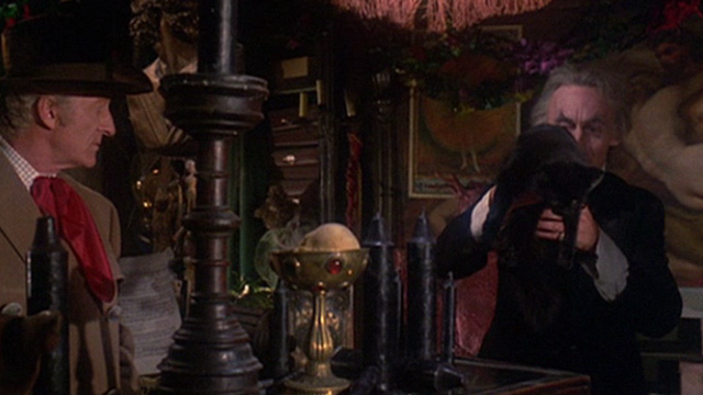 The House That Dripped Blood - black cat being set down by Theo Von Hartmann Geoffrey Bayldon with Paul Henderson John Pertwee