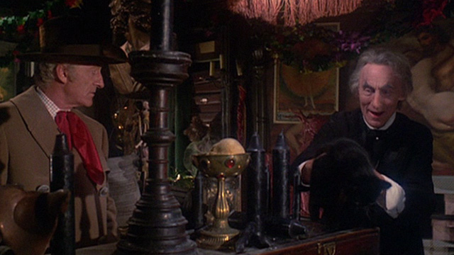 The House That Dripped Blood - black cat being set on counter by Theo Von Hartmann Geoffrey Bayldon with Paul Henderson John Pertwee