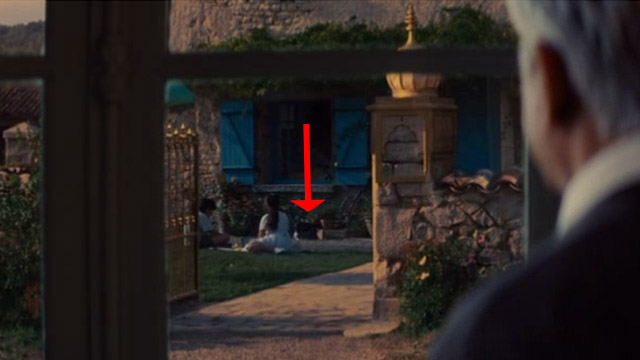 The Hundred-Foot Journey - black cat with white back legs walking behind Kadim children