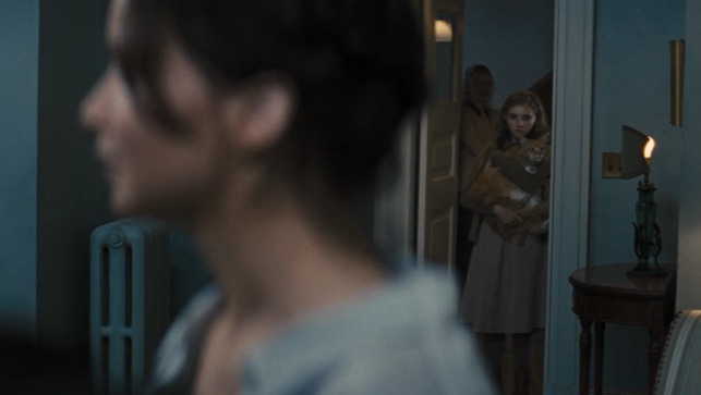 The Hunger Games: Catching Fire - Buttercup in Prim's arms
