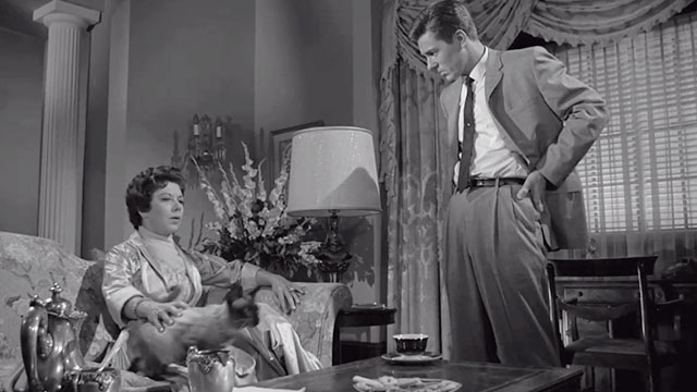 The Hypnotic Eye - woman on couch with Siamese cat jumping to coffee table and Detective Kennedy Joe Partridge