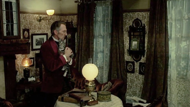I, Monster - Utterson Peter Cushing holding tabby cat Small Cat in room