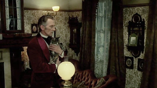 I, Monster - Utterson Peter Cushing holding tabby cat Small Cat in room